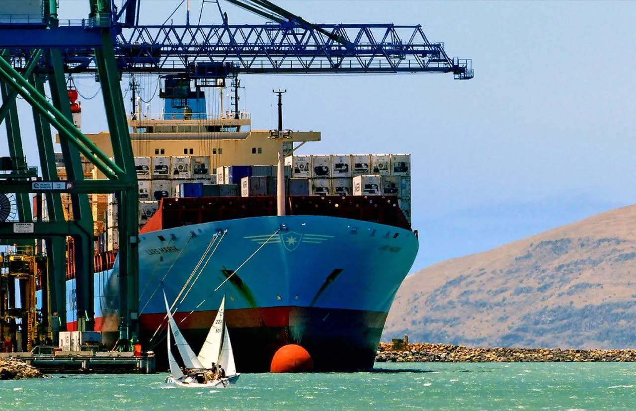 Container ship being loaded at a port terminal